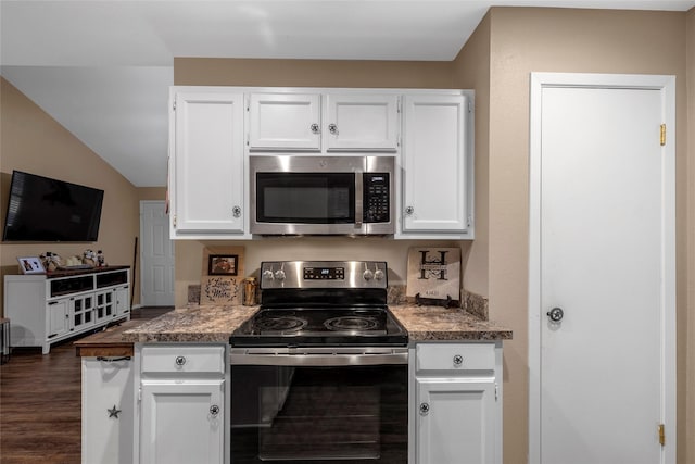 kitchen featuring white cabinetry, appliances with stainless steel finishes, and dark wood-type flooring