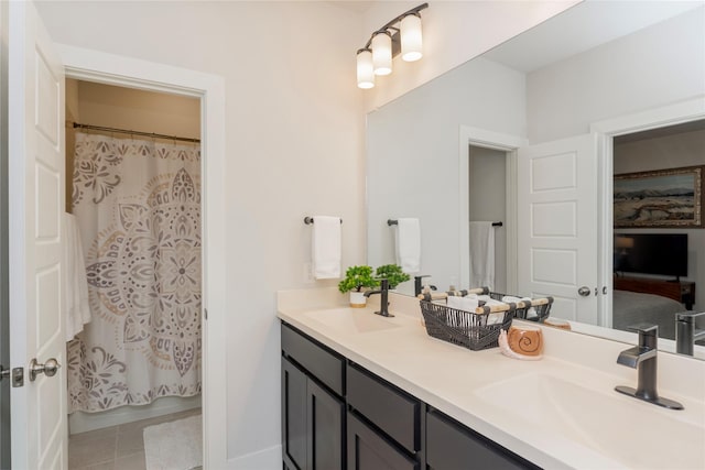 4908 Deavers Ln, Fort Worth, TX 76114 - bathroom with double vanity, tile patterned floors, and a shower with curtain