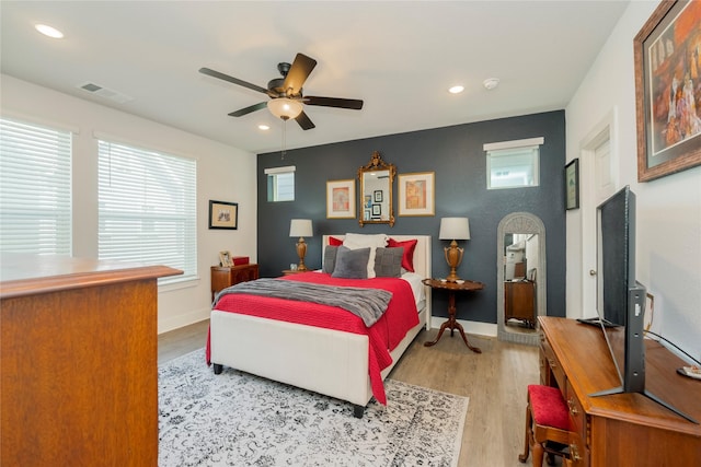 bedroom featuring visible vents, recessed lighting, and light wood-style floors