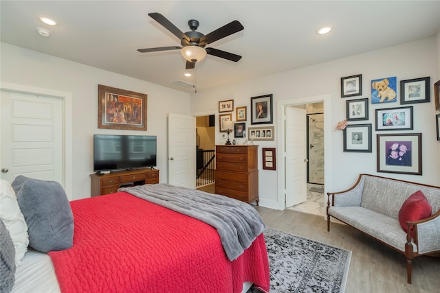 bedroom featuring recessed lighting, wood finished floors, and a ceiling fan
