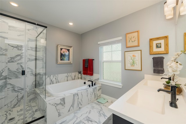 bathroom featuring a bath, marble finish floor, a sink, and a marble finish shower