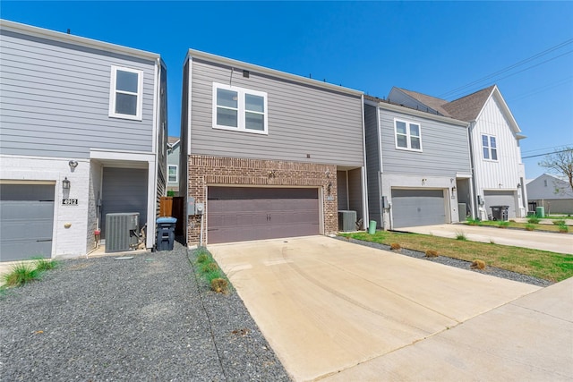 4908 Deavers Ln, Fort Worth, TX 76114 - view of front of home with a garage, driveway, and brick siding