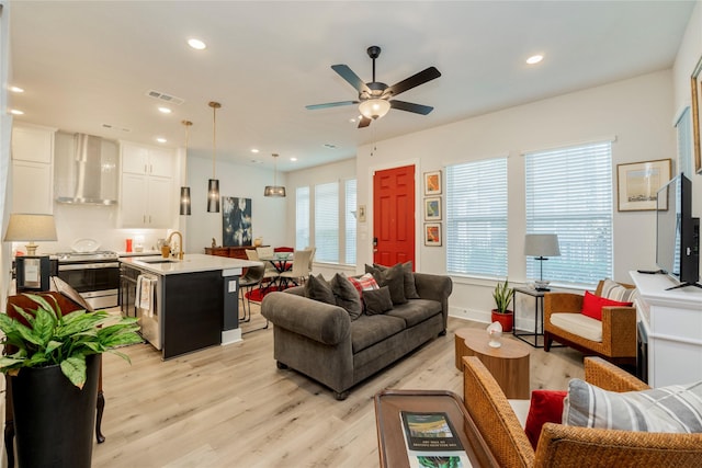 4908 Deavers Ln, Fort Worth, TX 76114 - living room featuring light wood-type flooring, ceiling fan, and recessed lighting