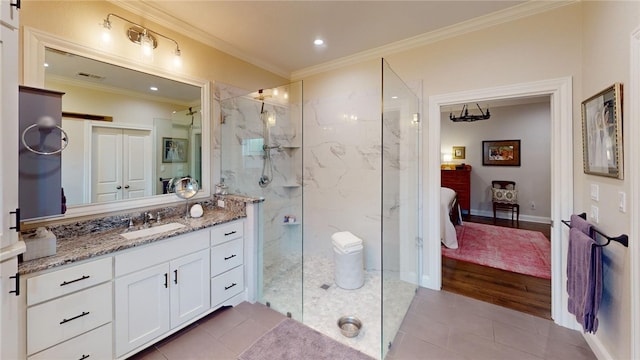 133 Creek Rdg, Waco, TX 76708 - full bath featuring ensuite bathroom, ornamental molding, vanity, a marble finish shower, and tile patterned flooring