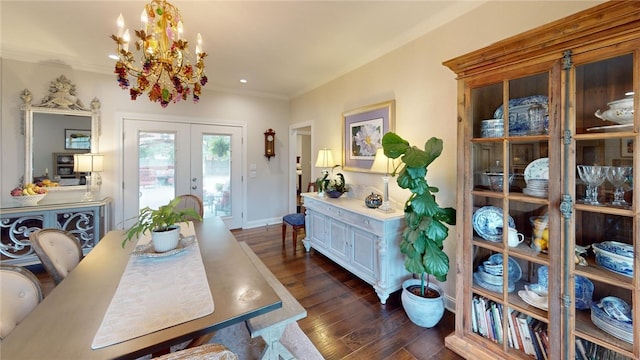 133 Creek Rdg, Waco, TX 76708 - dining space featuring a chandelier, french doors, dark wood-type flooring, crown molding, and baseboards