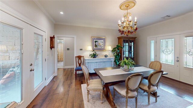 133 Creek Rdg, Waco, TX 76708 - dining area with dark wood-style floors, ornamental molding, a chandelier, recessed lighting, and french doors