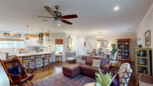 133 Creek Rdg, Waco, TX 76708 - living area featuring wood finished floors, a chandelier, a ceiling fan, recessed lighting, and crown molding
