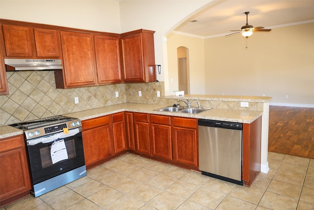 212 Telfair Ln, Bossier City, LA 71112 - kitchen with under cabinet range hood, a sink, crown molding, and appliances with stainless steel finishes