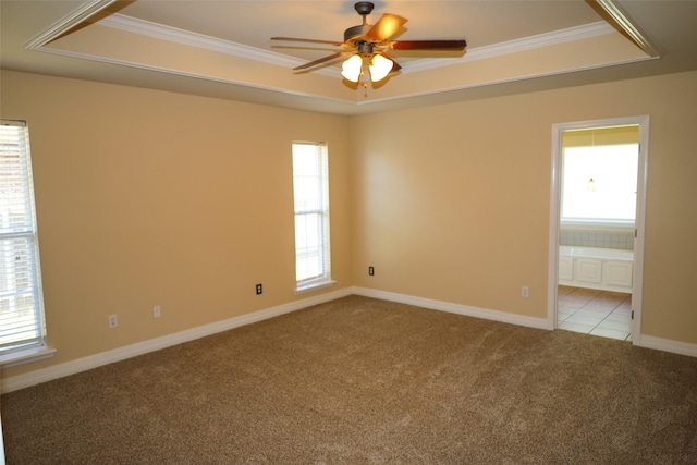 212 Telfair Ln, Bossier City, LA 71112 - spare room featuring crown molding, ceiling fan, light carpet, a raised ceiling, and baseboards