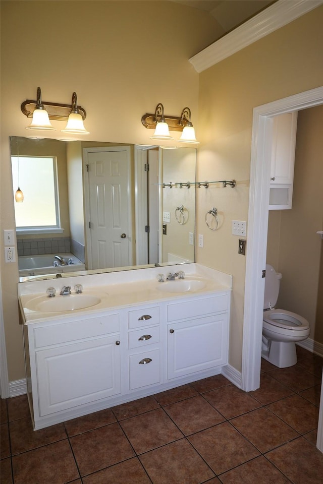 212 Telfair Ln, Bossier City, LA 71112 - full bathroom featuring tile patterned floors, double vanity, a sink, and toilet