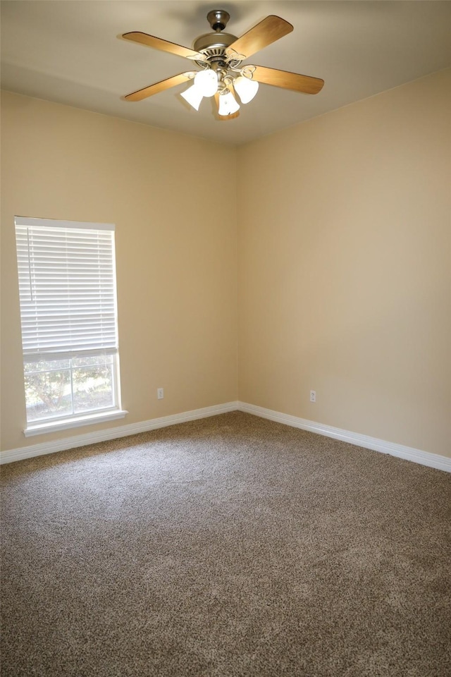 212 Telfair Ln, Bossier City, LA 71112 - empty room featuring carpet flooring, baseboards, and a ceiling fan