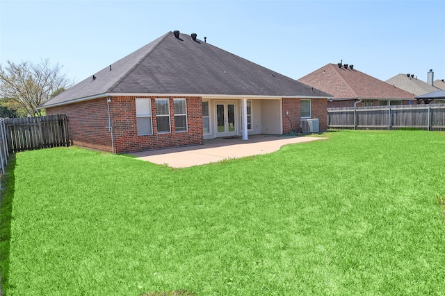 212 Telfair Ln, Bossier City, LA 71112 - back of property with french doors, a yard, a patio area, and brick siding