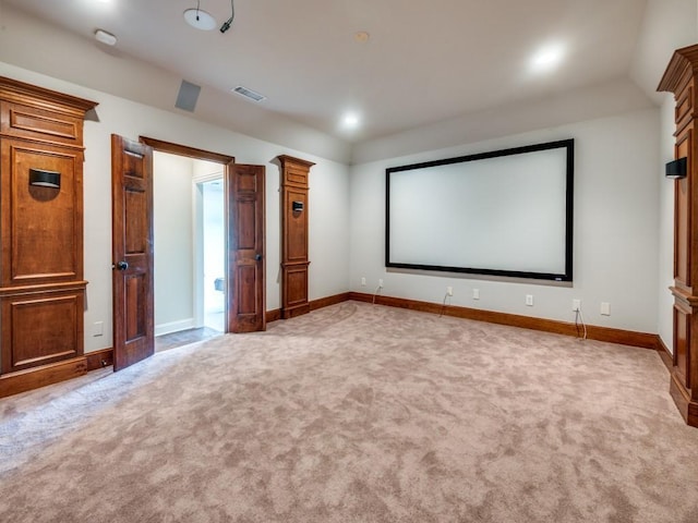 home theater with visible vents, carpet flooring, and baseboards