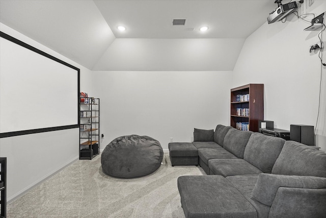 home theater room featuring recessed lighting, vaulted ceiling, visible vents, and carpet