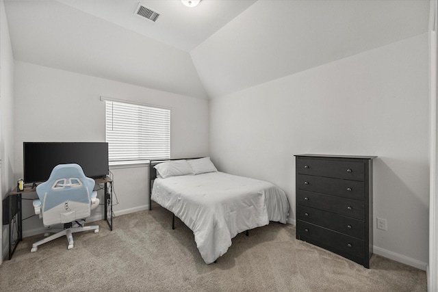 bedroom with light carpet, baseboards, lofted ceiling, and visible vents