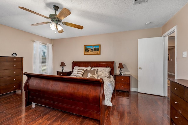 515 Meadow Dr, Lowry Crossing, TX 75069 - bedroom with dark wood finished floors, ceiling fan, and a textured ceiling
