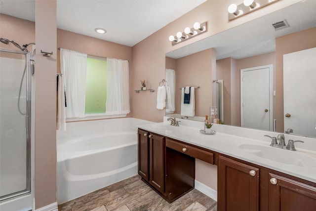 515 Meadow Dr, Lowry Crossing, TX 75069 - bathroom with a garden tub, a stall shower, and double vanity