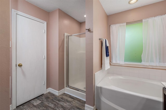 515 Meadow Dr, Lowry Crossing, TX 75069 - bathroom featuring a stall shower and a bath