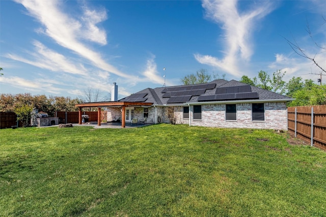 515 Meadow Dr, Lowry Crossing, TX 75069 - back of house featuring a patio area, solar panels, a shingled roof, and brick siding