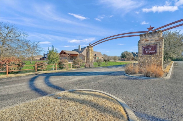 4994 Dogwood Dr, Celina, TX 75009 - view of asphalt road featuring curbs
