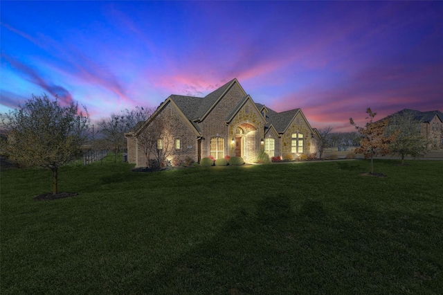 4994 Dogwood Dr, Celina, TX 75009 - french provincial home featuring a lawn, stone siding, and brick siding