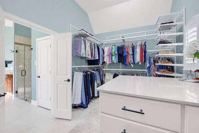 4994 Dogwood Dr, Celina, TX 75009 - spacious closet featuring light tile patterned flooring and lofted ceiling