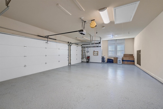 4994 Dogwood Dr, Celina, TX 75009 - garage featuring a garage door opener