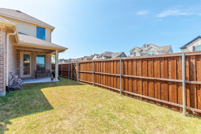 564 Embargo Dr, Fate, TX 75189 - view of yard featuring a fenced backyard, a residential view, and a patio