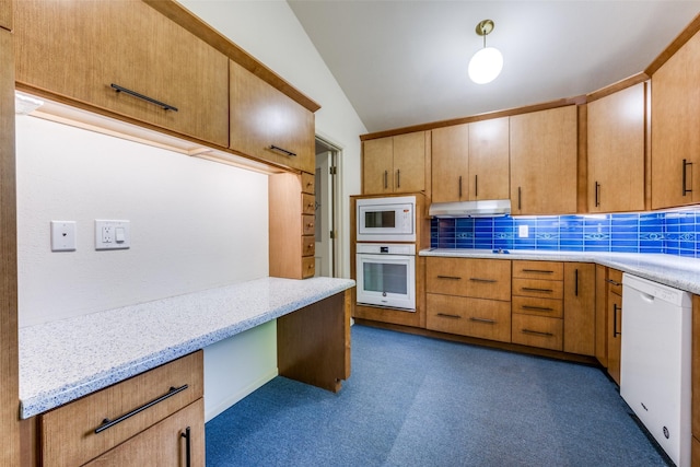 kitchen with under cabinet range hood, backsplash, vaulted ceiling, and white appliances