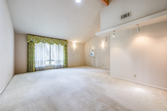 unfurnished room with beam ceiling, high vaulted ceiling, carpet, baseboards, and visible vents