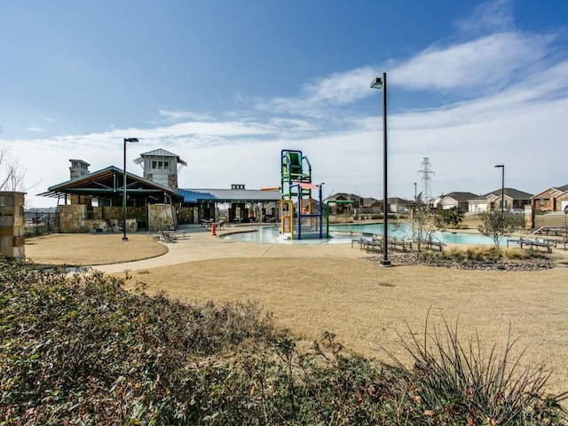 2441 Senepol Way, Fort Worth, TX 76131 - view of playground featuring a community pool and a water play area