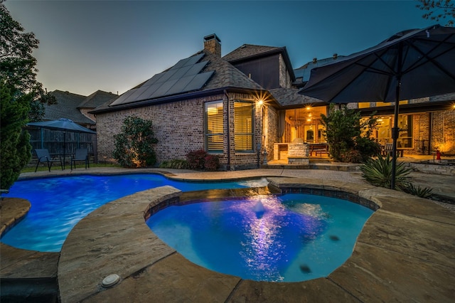 7201 Millard Pond Dr, Mckinney, TX 75071 - view of pool featuring a patio area, outdoor dining space, and a pool with connected hot tub