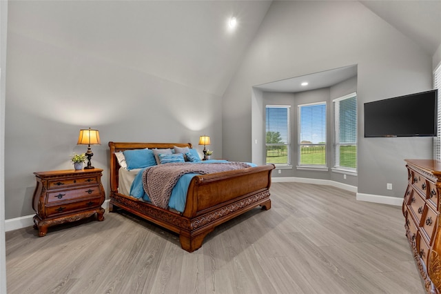 160 Pioneer Ct, Royse City, TX 75189 - bedroom featuring baseboards, light wood-style flooring, high vaulted ceiling, and recessed lighting