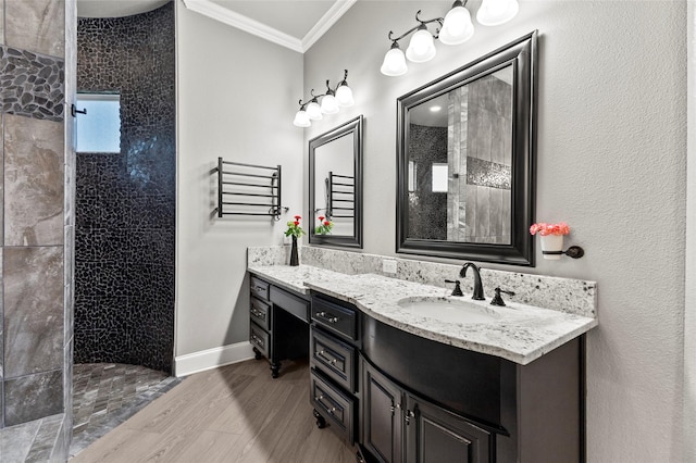 160 Pioneer Ct, Royse City, TX 75189 - bathroom featuring ornamental molding, walk in shower, vanity, wood finished floors, and baseboards