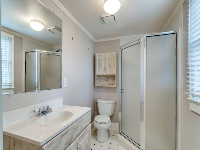 bathroom featuring a shower stall, toilet, and ornamental molding