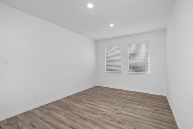 14828 Devils Claw Trl, Fort Worth, TX 76052 - unfurnished room with wood finished floors and recessed lighting
