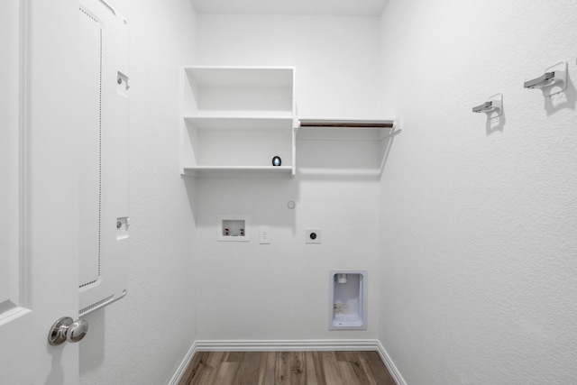 14828 Devils Claw Trl, Fort Worth, TX 76052 - washroom featuring electric dryer hookup, hookup for a gas dryer, wood finished floors, and washer hookup
