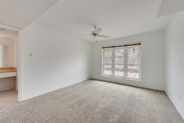 10550 High Hollows Dr Unit 233, Dallas, TX 75230 - carpeted spare room with ceiling fan and baseboards