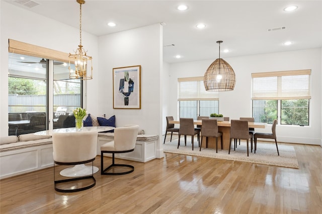 10415 Eastlawn Dr, Dallas, TX 75229 - dining area featuring a notable chandelier, visible vents, recessed lighting, and light wood-type flooring