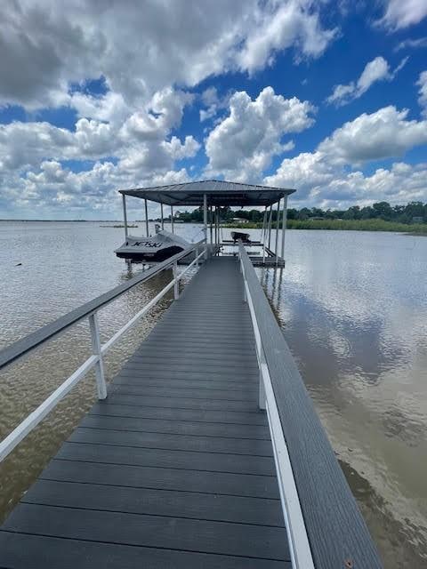 6827 Briar Rd, Azle, TX 76020 - dock area featuring a water view and boat lift