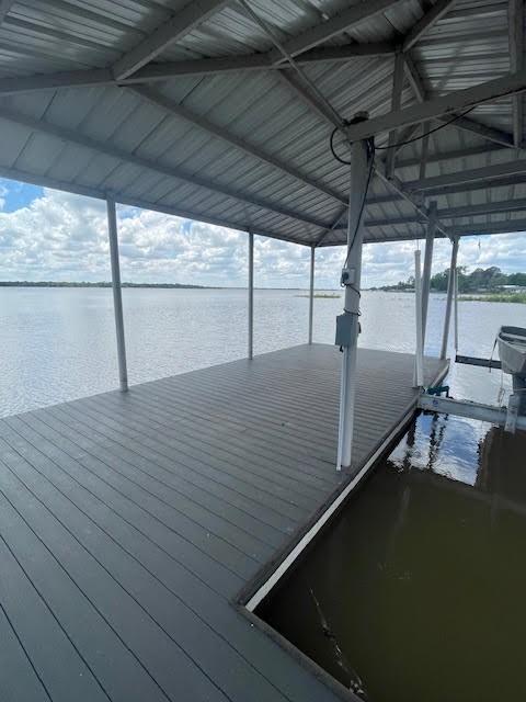 6827 Briar Rd, Azle, TX 76020 - dock area with boat lift and a water view