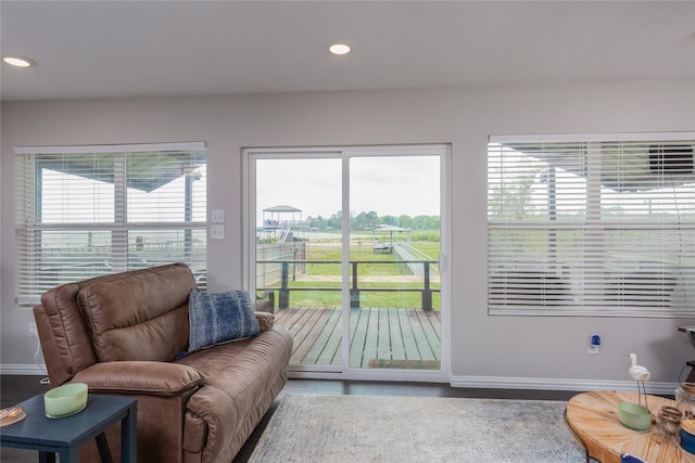 6827 Briar Rd, Azle, TX 76020 - living room featuring baseboards, wood finished floors, and recessed lighting
