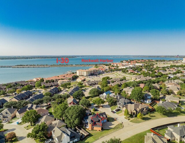 101 Reliance Ct, Rockwall, TX 75032 - aerial perspective of suburban area featuring a large body of water