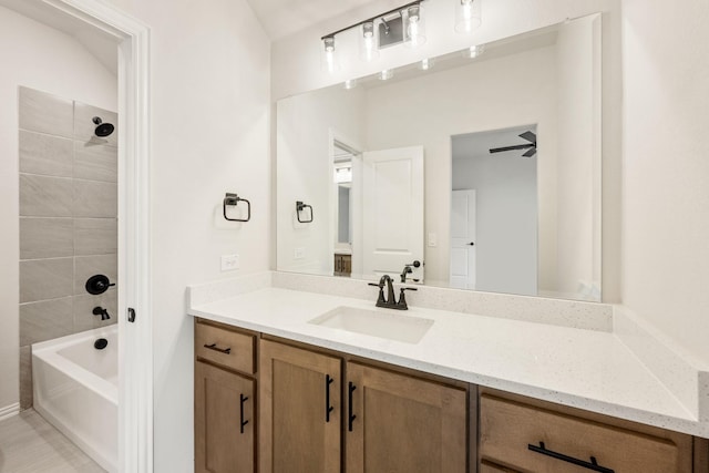 full bathroom featuring vanity and washtub / shower combination