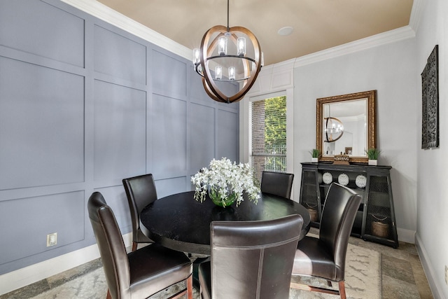 1121 Crystal Falls Dr, Prosper, TX 75078 - dining space with a chandelier, baseboards, crown molding, and a decorative wall