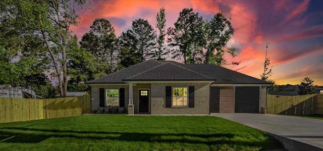 2377 Ridgley Dr, Flint, TX 75762 - view of front of property featuring concrete driveway, a garage, and brick siding