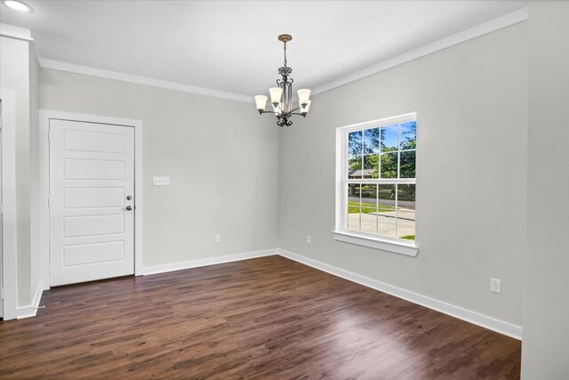 2377 Ridgley Dr, Flint, TX 75762 - spare room with a chandelier, ornamental molding, baseboards, and dark wood-type flooring