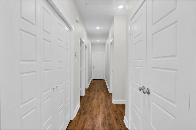 2377 Ridgley Dr, Flint, TX 75762 - corridor with baseboards, dark wood finished floors, and recessed lighting