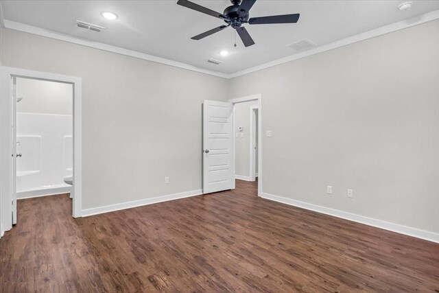 2377 Ridgley Dr, Flint, TX 75762 - unfurnished bedroom featuring ornamental molding, dark wood finished floors, baseboards, recessed lighting, and ensuite bath