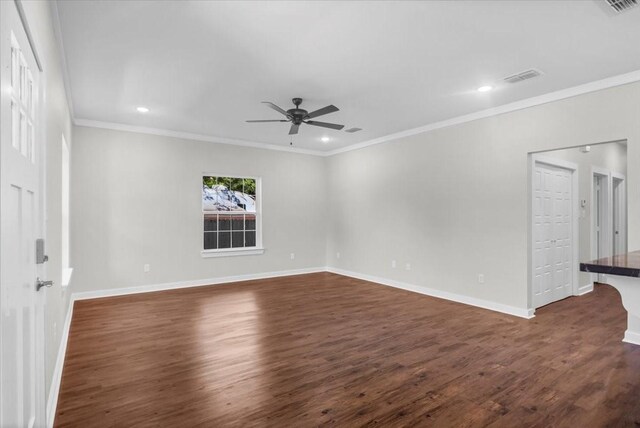 2377 Ridgley Dr, Flint, TX 75762 - spare room with dark wood-style flooring, ceiling fan, crown molding, baseboards, and recessed lighting